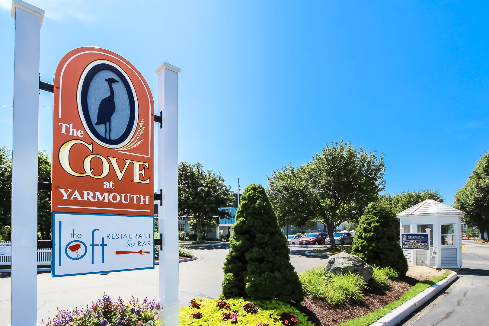 Beautiful skies and resort entrance at VRI's The Cove at Yarmouth in Massachusetts.